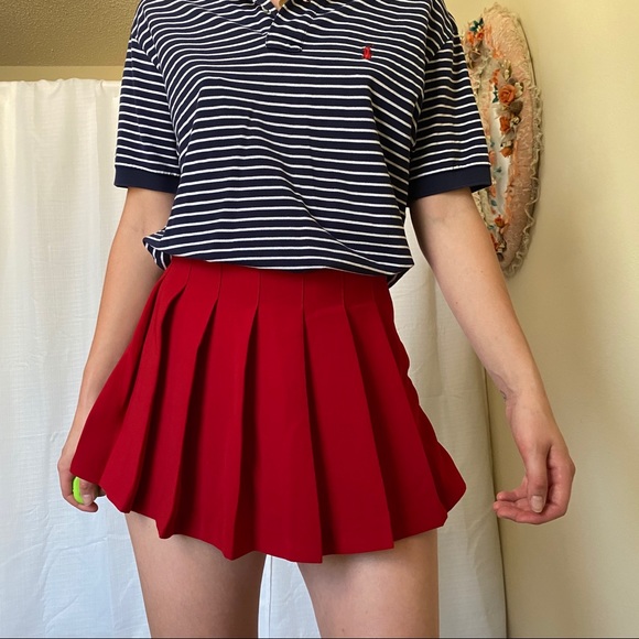 red pleated miniskirt